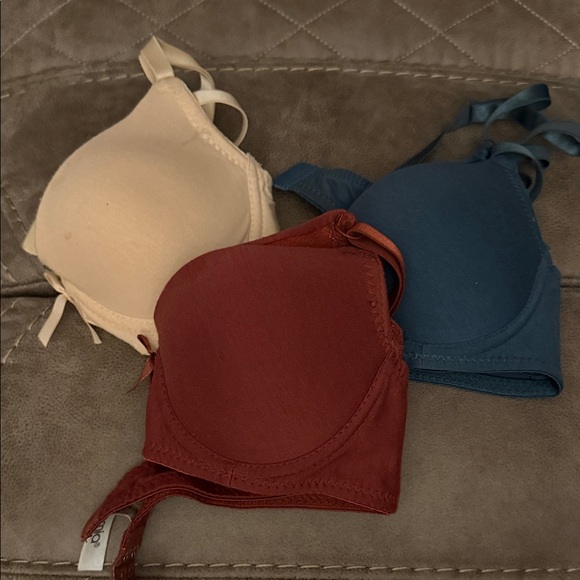 Set of Three Bras in Beige, Rust, and Blue - Picture 1 of 2